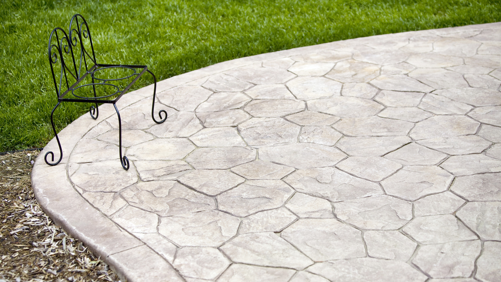 Easily Clean Your Concrete Patio With Just One Kitchen Staple