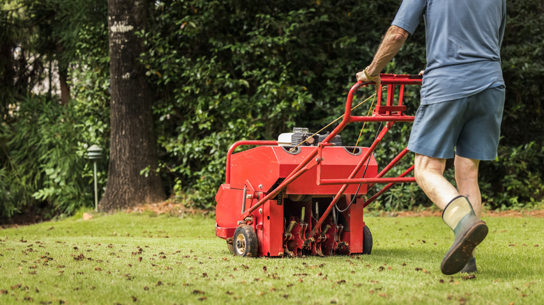 Person using aerating machine