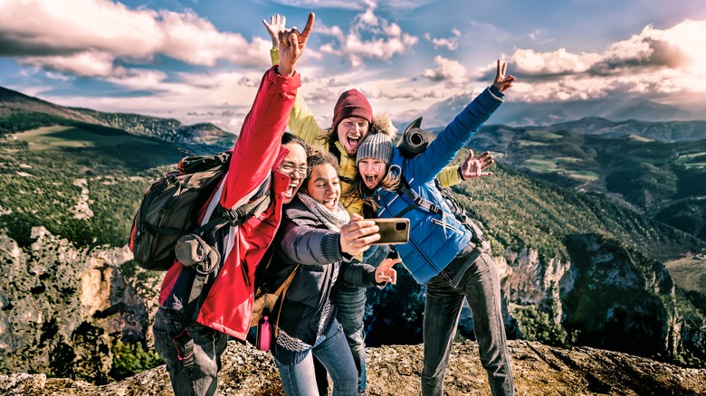 Happy hikers taking a selfie 