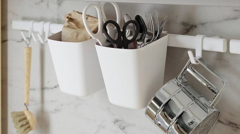 Trinket container hanging in kitchen