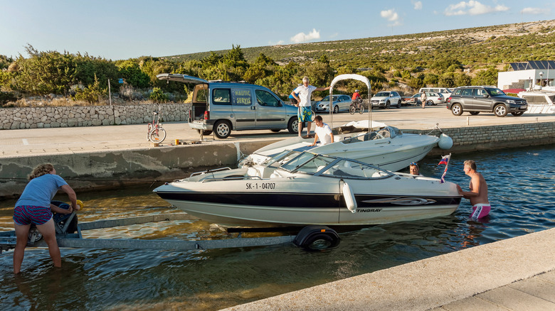 putting boat on trailer