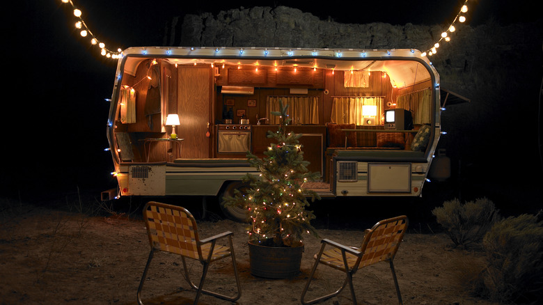 Camping trailer with string lights 