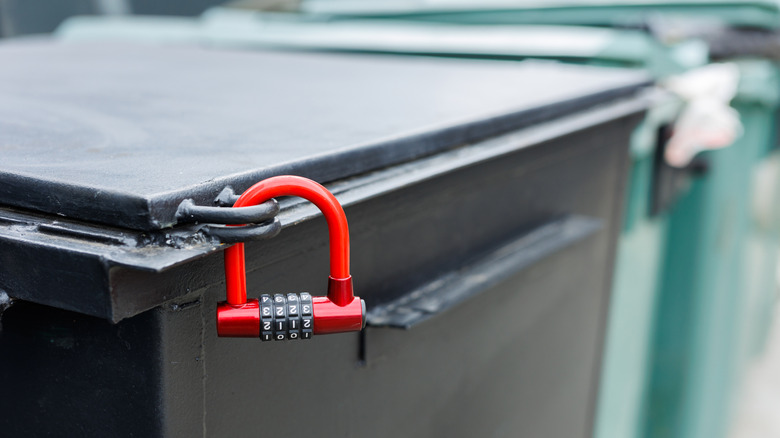 Locked trash can, close up