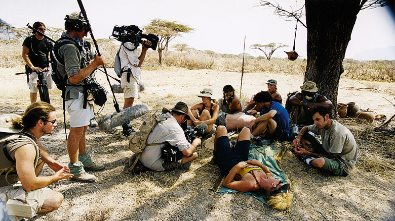 Survivor camera crew with tribe members 