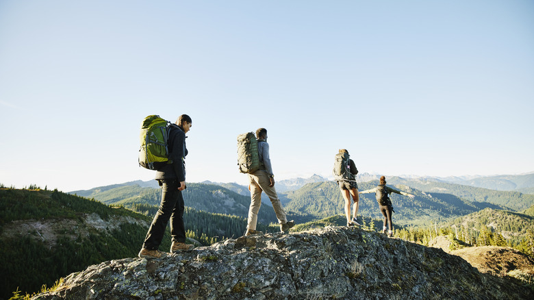 Backpackers walking along a ridge