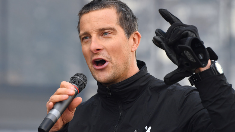 Bear Grylls pointing and talking