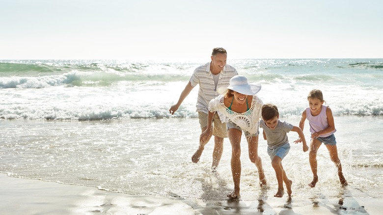 family on beach in florida