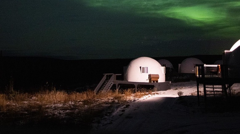 Borealis basecamp igloo under the Aurora