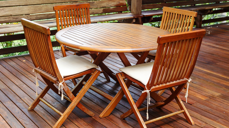 wooden garden furniture on a deck