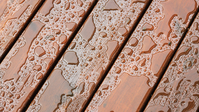 Water on wooden deck