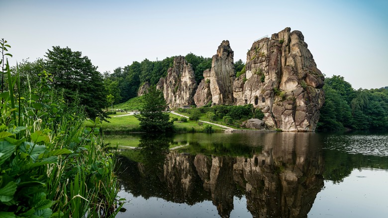 View of forest, rocks, and lake in Germany