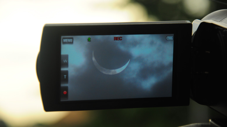 View of camera screen recording eclipse