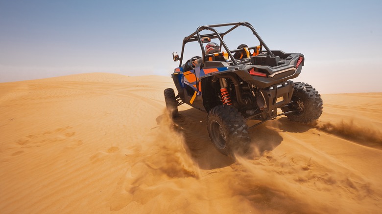 Sand buggy on a sand dune