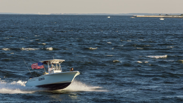 small boat in rough water