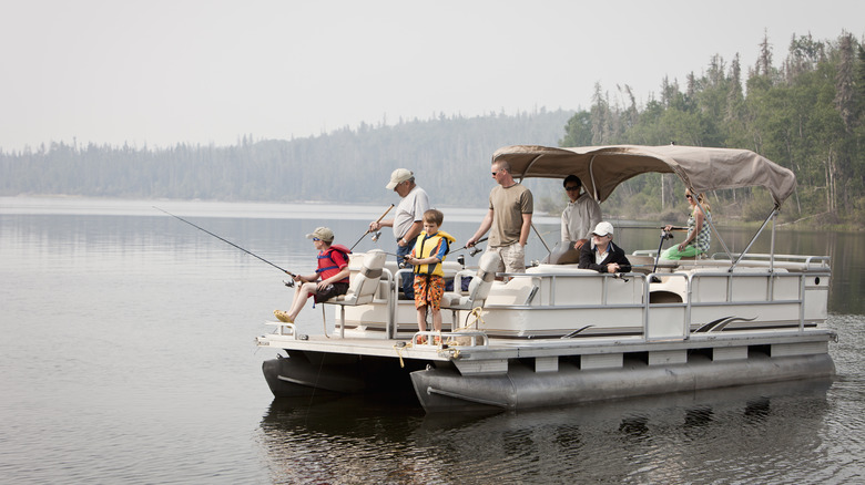 family fishing on pontoon boat