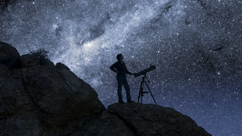 Stargazer with telescope