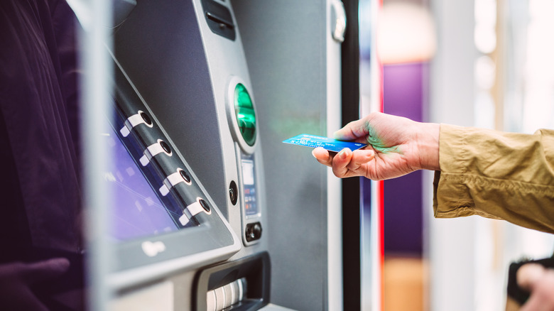 Person using atm