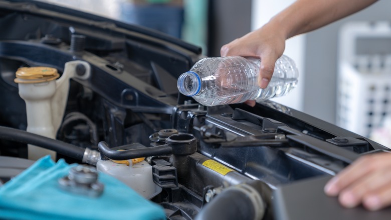 Filling car radiator with water