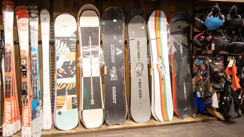 Snowboards lined up in shop