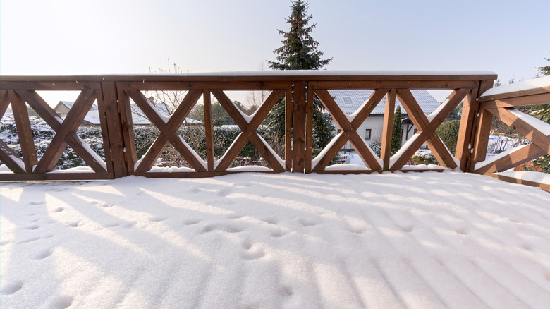 deck covered in ice and snow