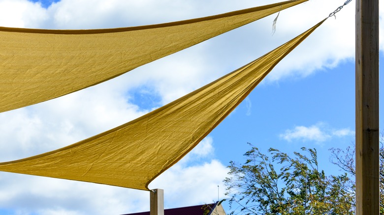 Sun shade with sky behind