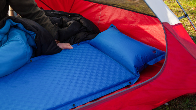 Sleeping bag mat inside a tent