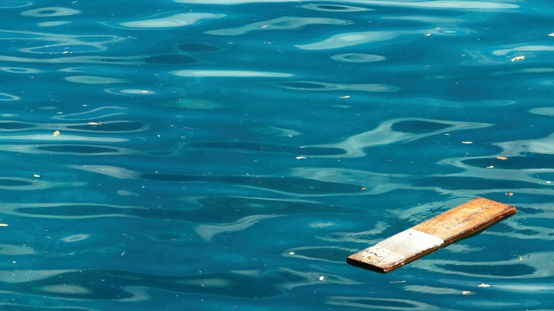 board floating in water