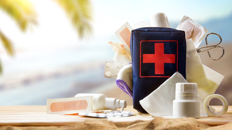 First aid kit on a table at beach