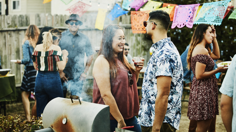 Loud backyard bbq with many people