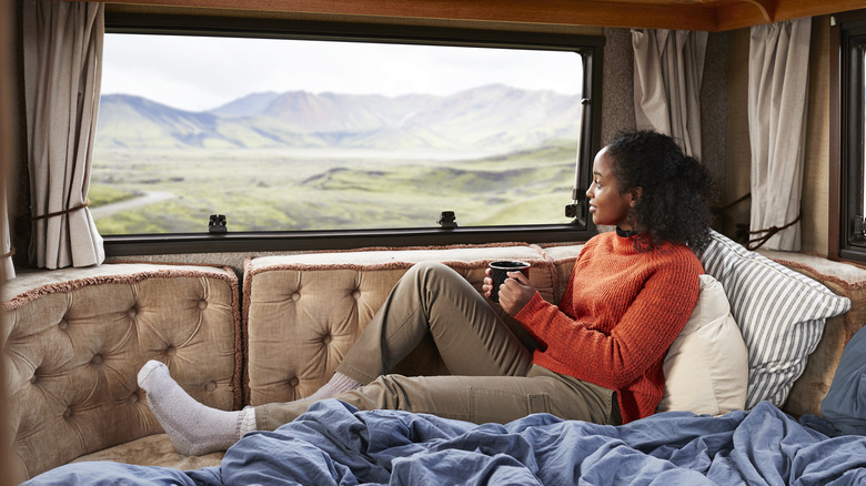 Woman getting cozy in her RV