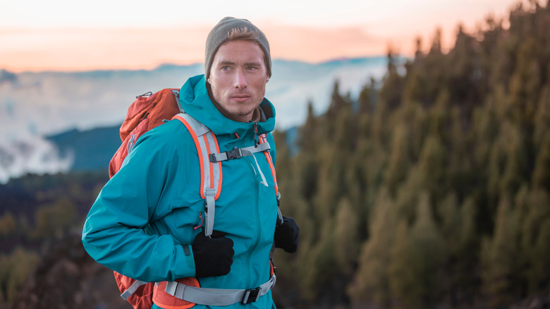 Hiker wearing layers of clothing 