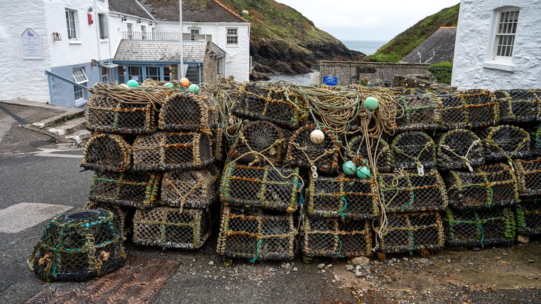 Crab pots stacked on beach