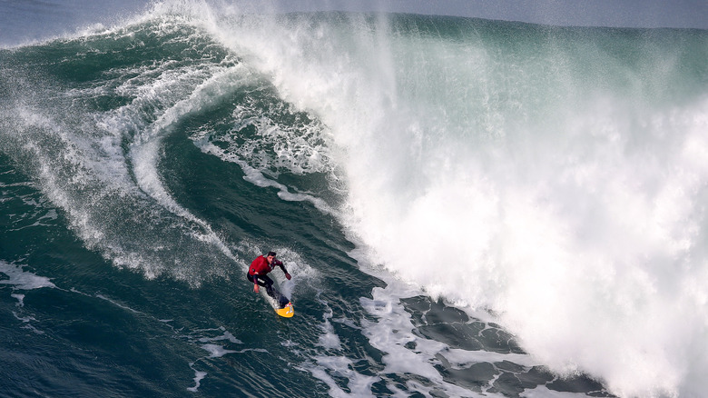 Big wave surfer off the coast of Portugal 