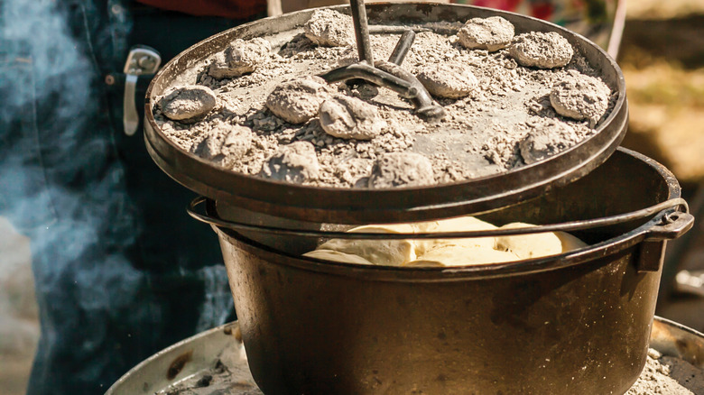 cast iron dutch oven with biscuits