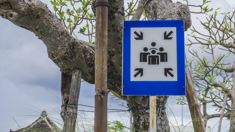 Evacuation meeting point sign