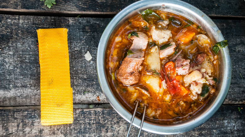 Bowl of stew on table