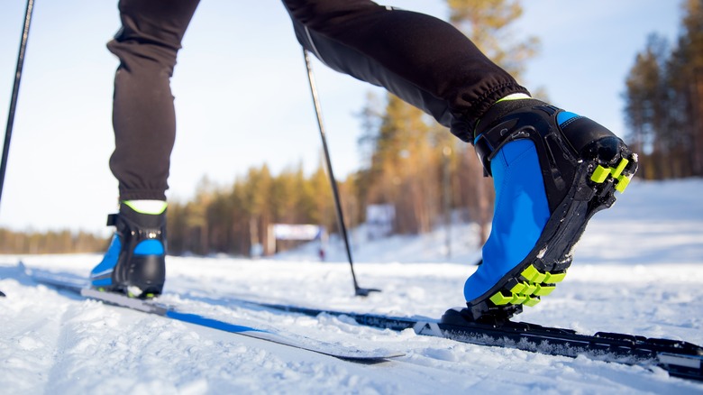 Cross country ski boots in use