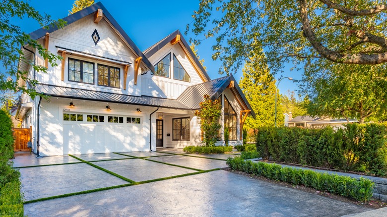 large house with concrete driveway