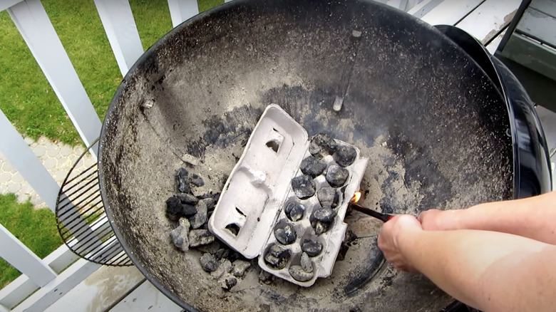 Lighting an egg carton full of charcoal