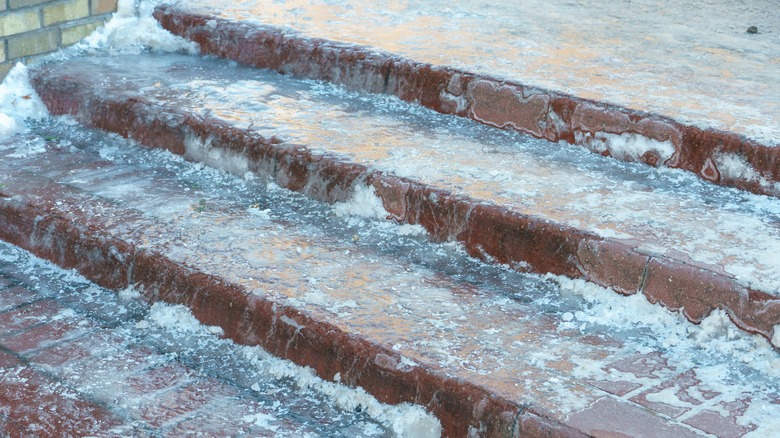 Ice-covered steps leading to porch