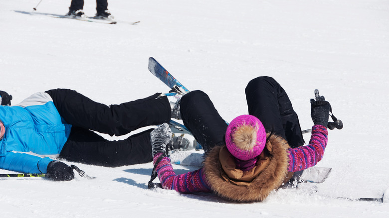 Two people on ground after ski collision