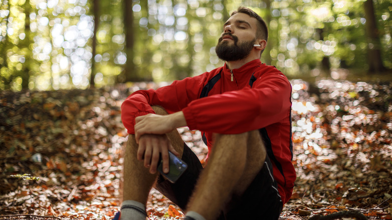 Hiker staying calm and meditating 