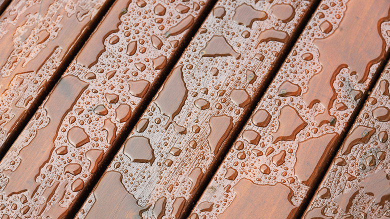 Water on wooden deck