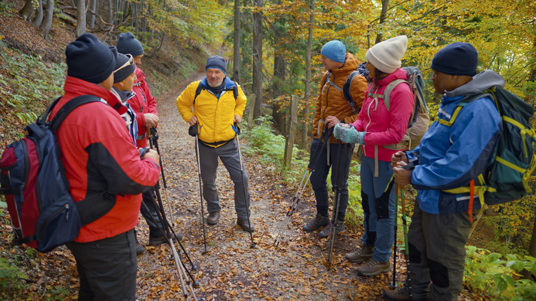 fall hikers with jackets