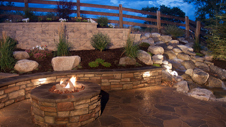 Outdoor seating wall near firepit