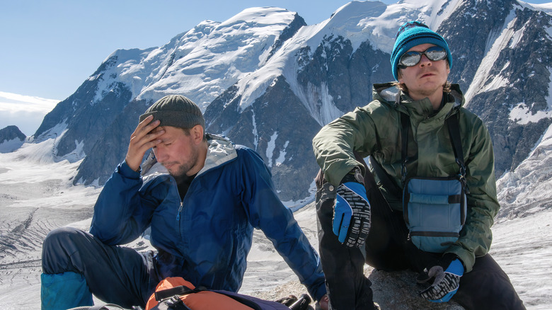 Mountaineer at high altitude with headache