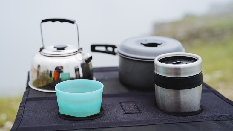 Cookware set on outdoor table