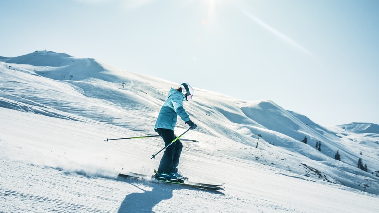 Person skiing down mountain