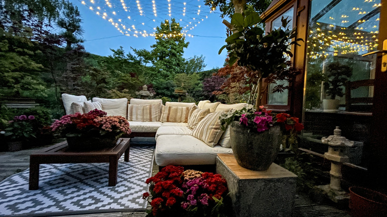 patio with rug and lights