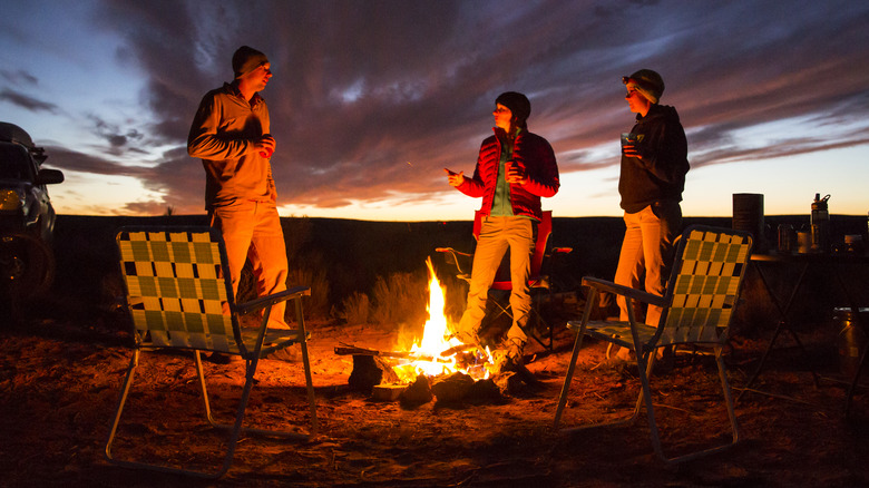 people around campfire